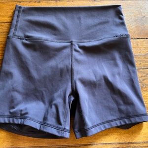 Til you collapses spandex shorts.